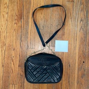 Black Tory Burch crossbody bag very spacious. Comes w/ dust bag Offers accepted